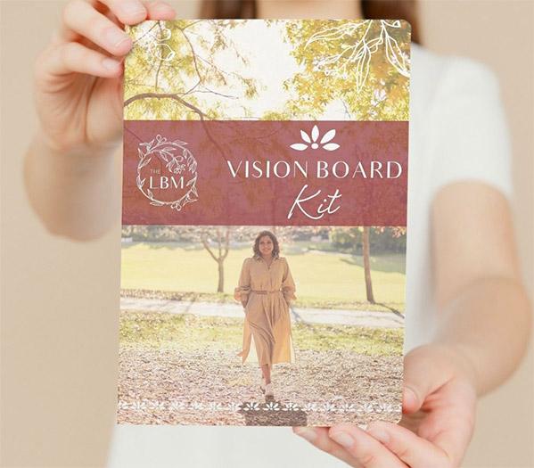 Vision board kit cover with life coach walking in park smiling